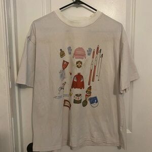 Never Fully Dressed White Crewneck Tee with Multicolor Winter Graphic